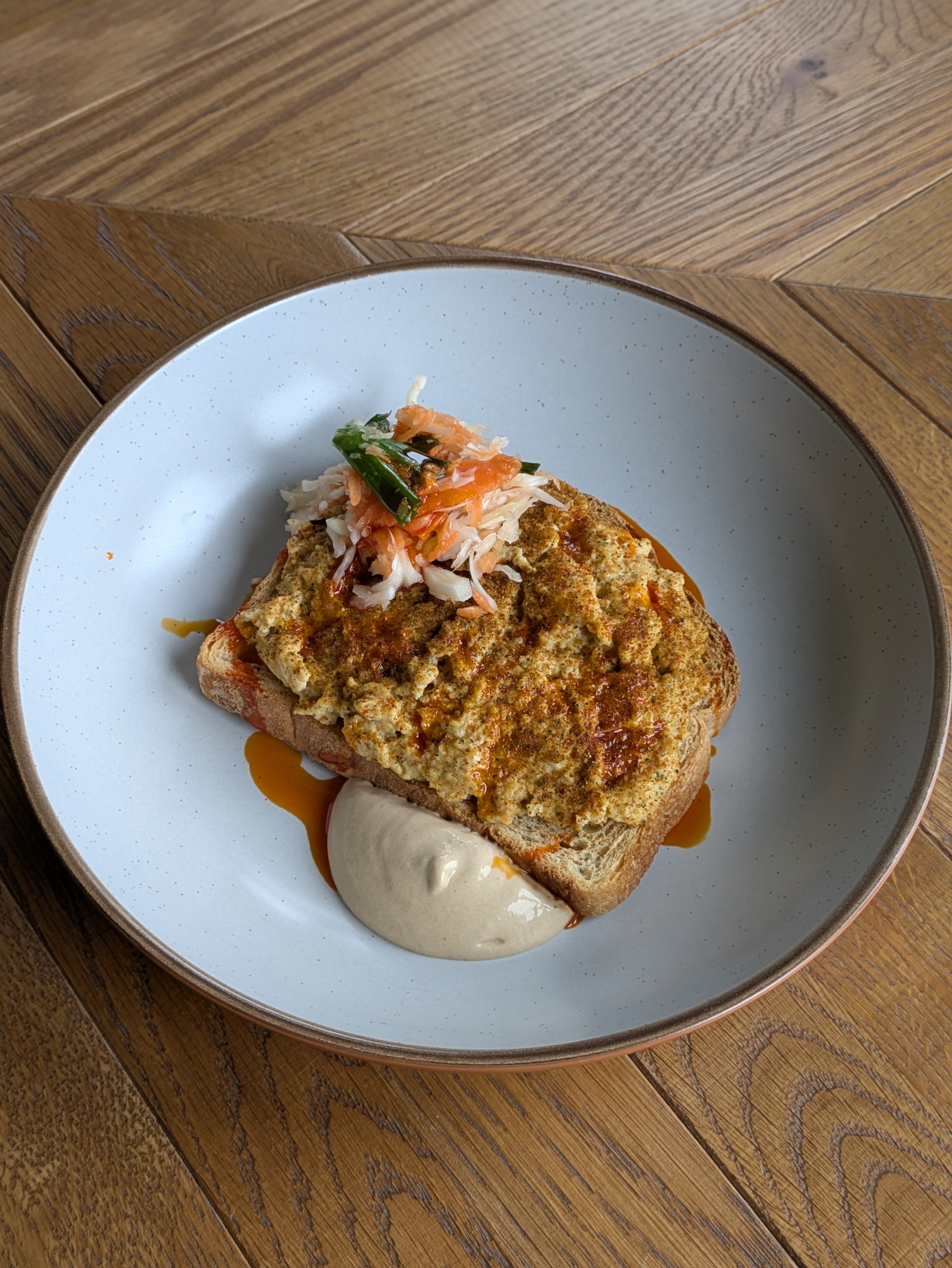 Scrambled eggs with kimchi seasoning and Jan’s Garlic Mayo on toasted sourdough